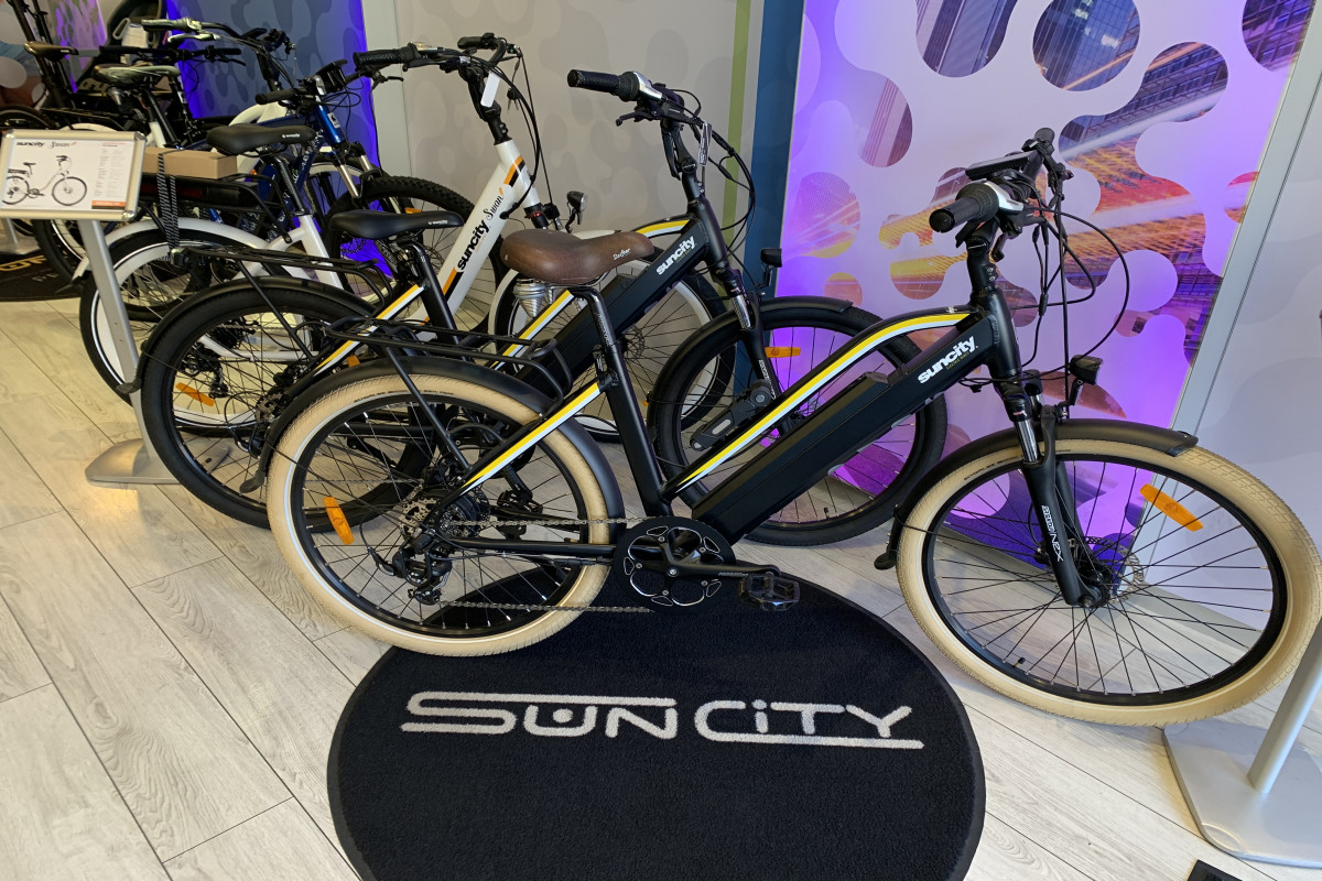 Concept français sous notre propre marque Suncity déposé depuis 2009 . Transmission et accompagnement  , spécialisé dans le vélo électrique pliant , de haute qualité .