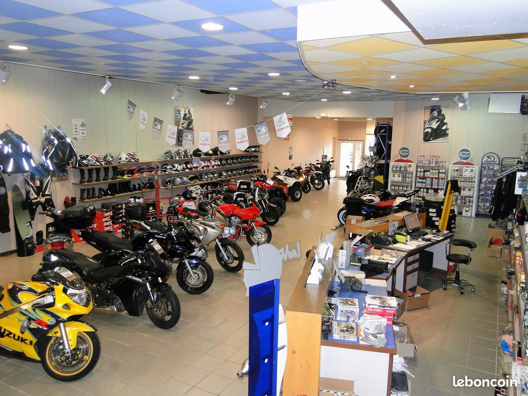 Garage et commerce de motos quads cyclos